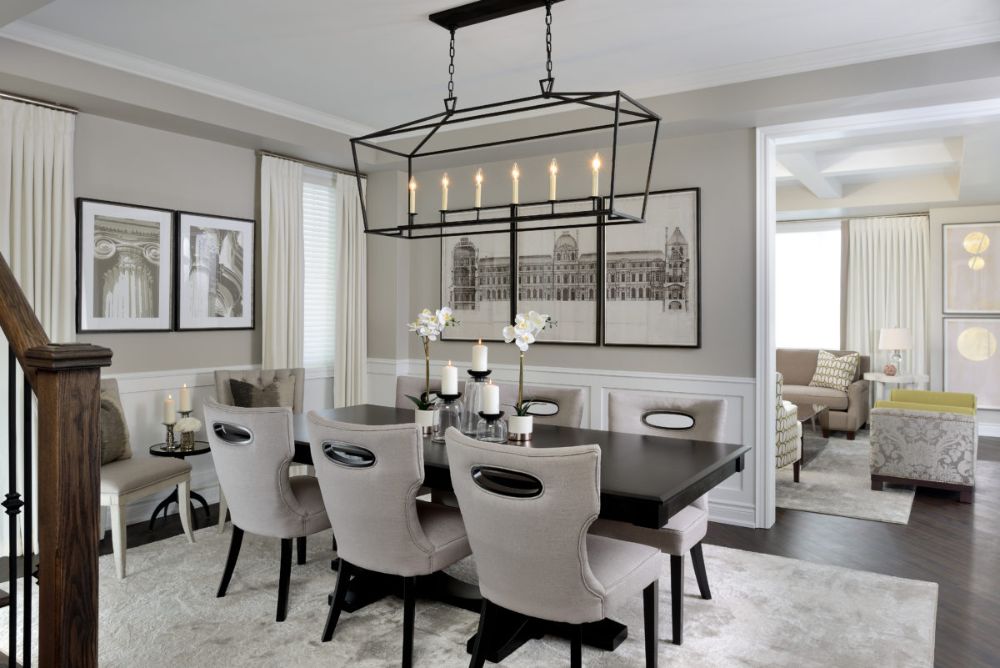 modern dining room with gray area rug
