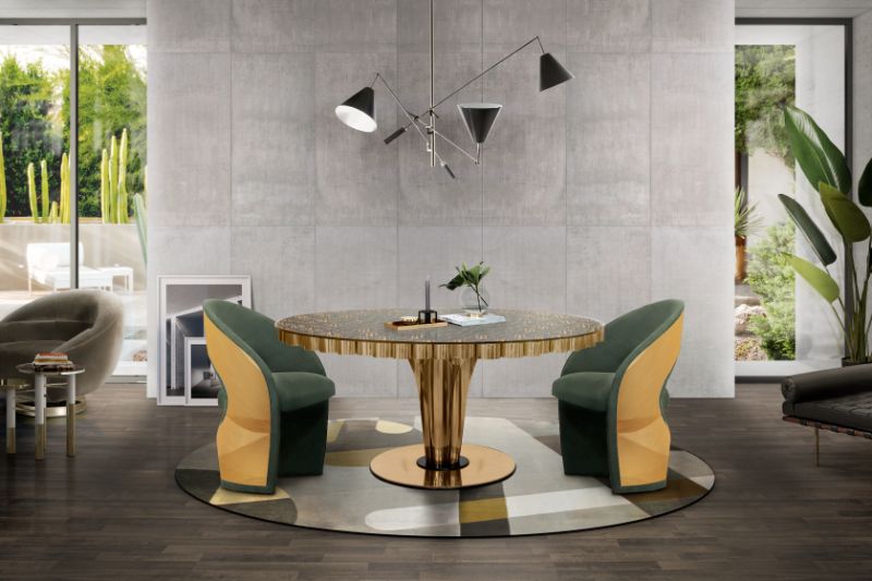 A mid-century dining room with Joh Rug, mid-century chairs and round dining table