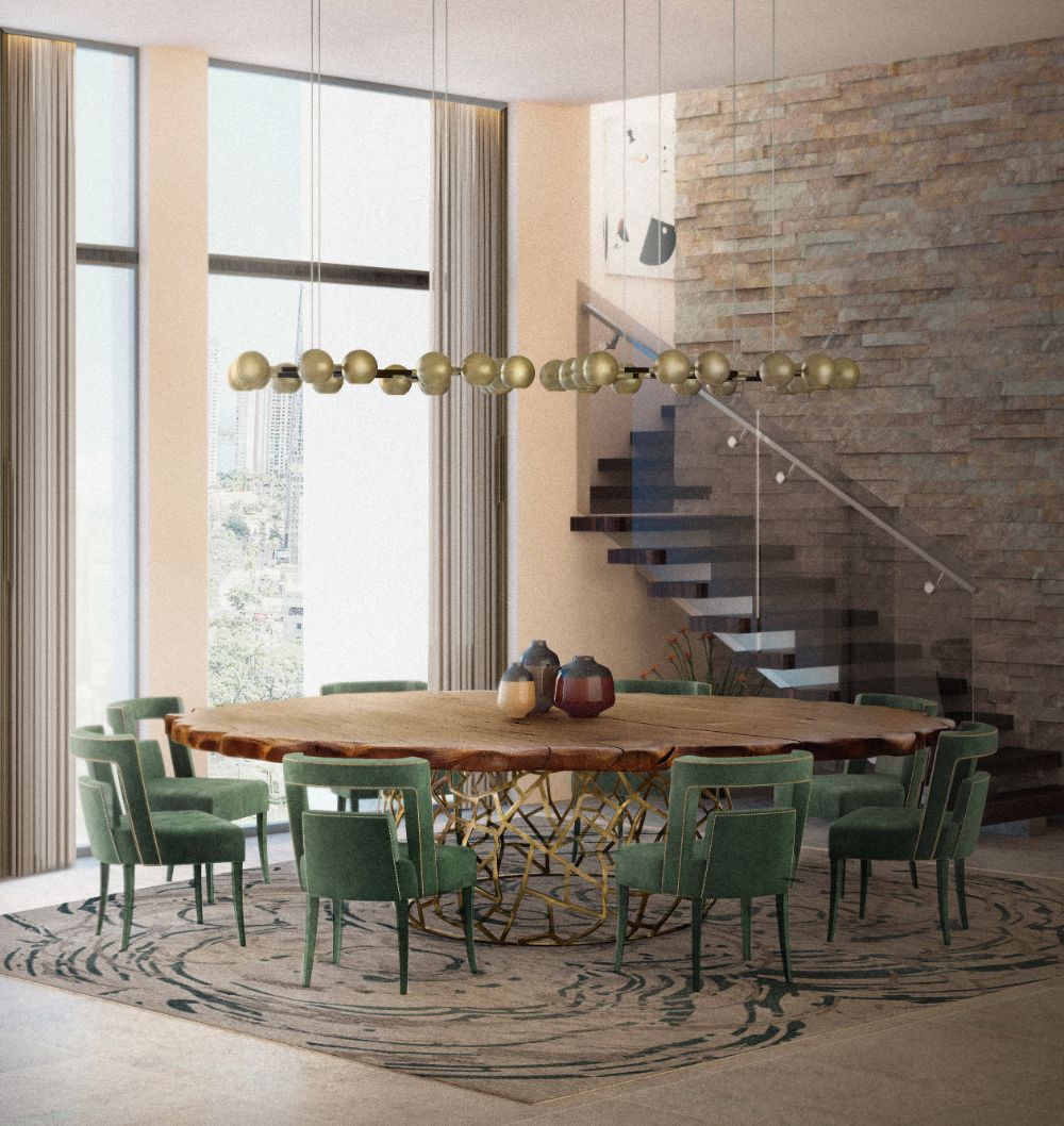 contemporary dining room with Merfilus rug, round wooden dining table with golden legs, gray dining chairs