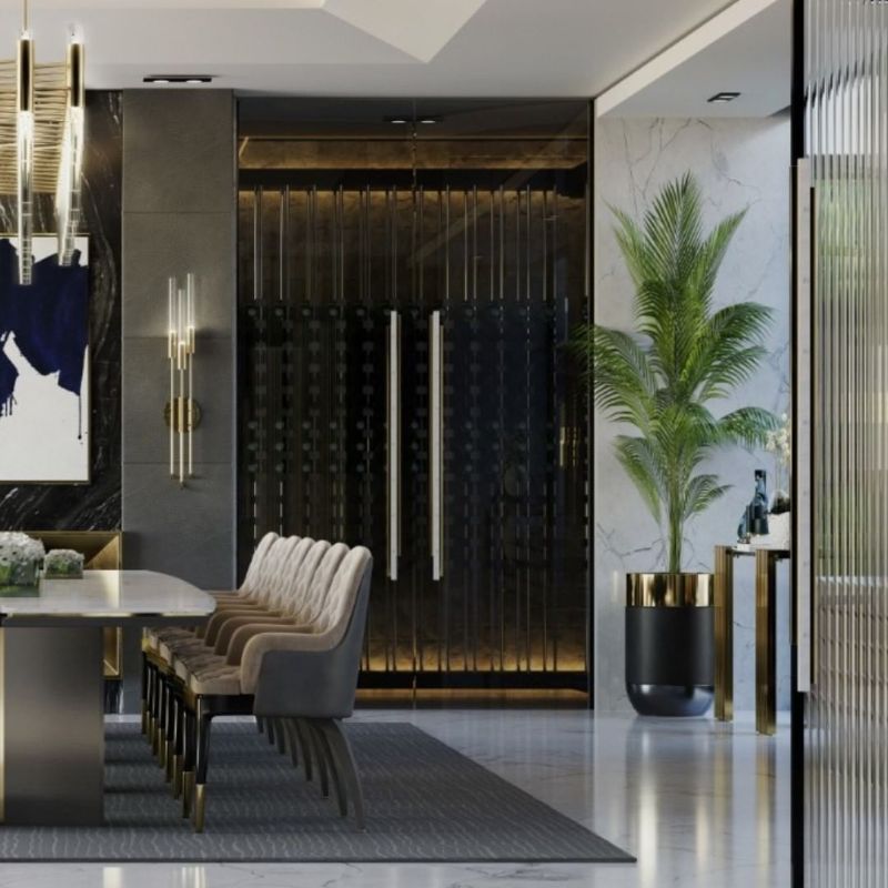 Minimalist dining room with gray area rug and dining table with suspension lights