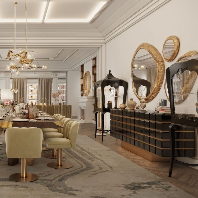 Agatha rug decorates this claasy dining room with golden round mirror and hera hanging lights