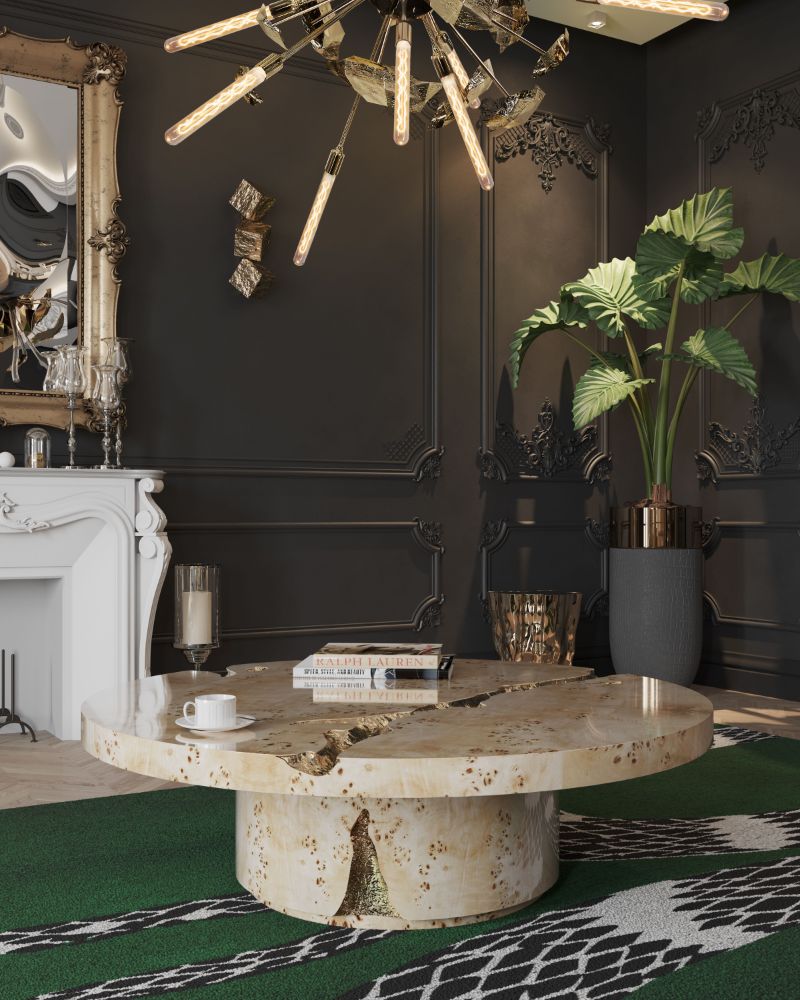 Modern contemporary living room with Snake rug in green and Supernova chandelier and round center table in with a marbled pattern