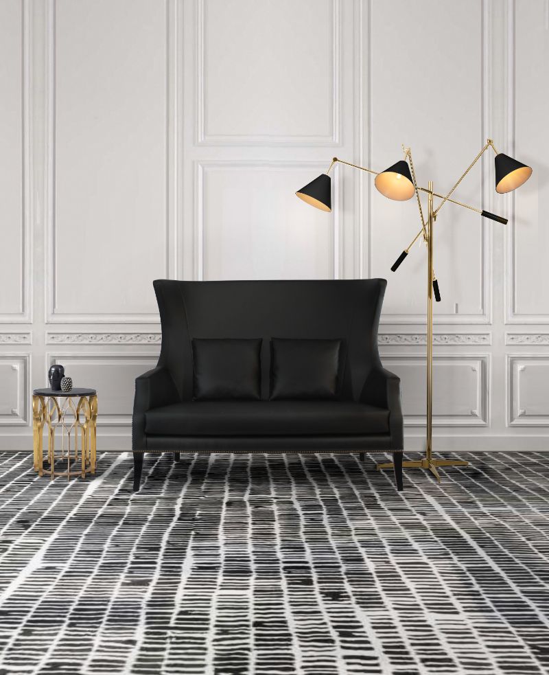 Modern hallway with COLL RUG in blakc and white and 2 seat armchair. Minimalist Rugs: The Latest Interior Trends