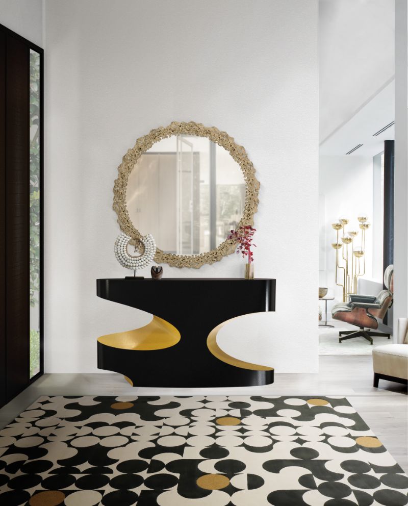 Modern hallway with YARSA RUG in black and white with neutral colors and circular pattern, paired with black and gold console and round golden mirror for a luxurious project of hallway renovation