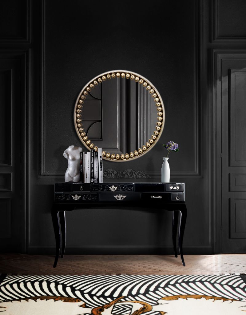 Classic minimalist hallway with COUPLE RUG in black and white with touch of gold, black console and round mirror. Minimalist Rugs: The Latest Interior Trends