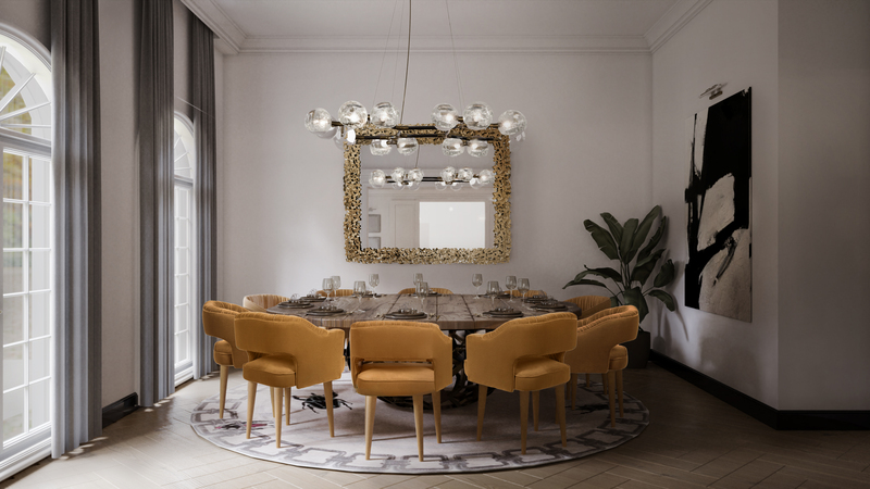 contemporary dining room with round rug and paried with orange dining chairs.