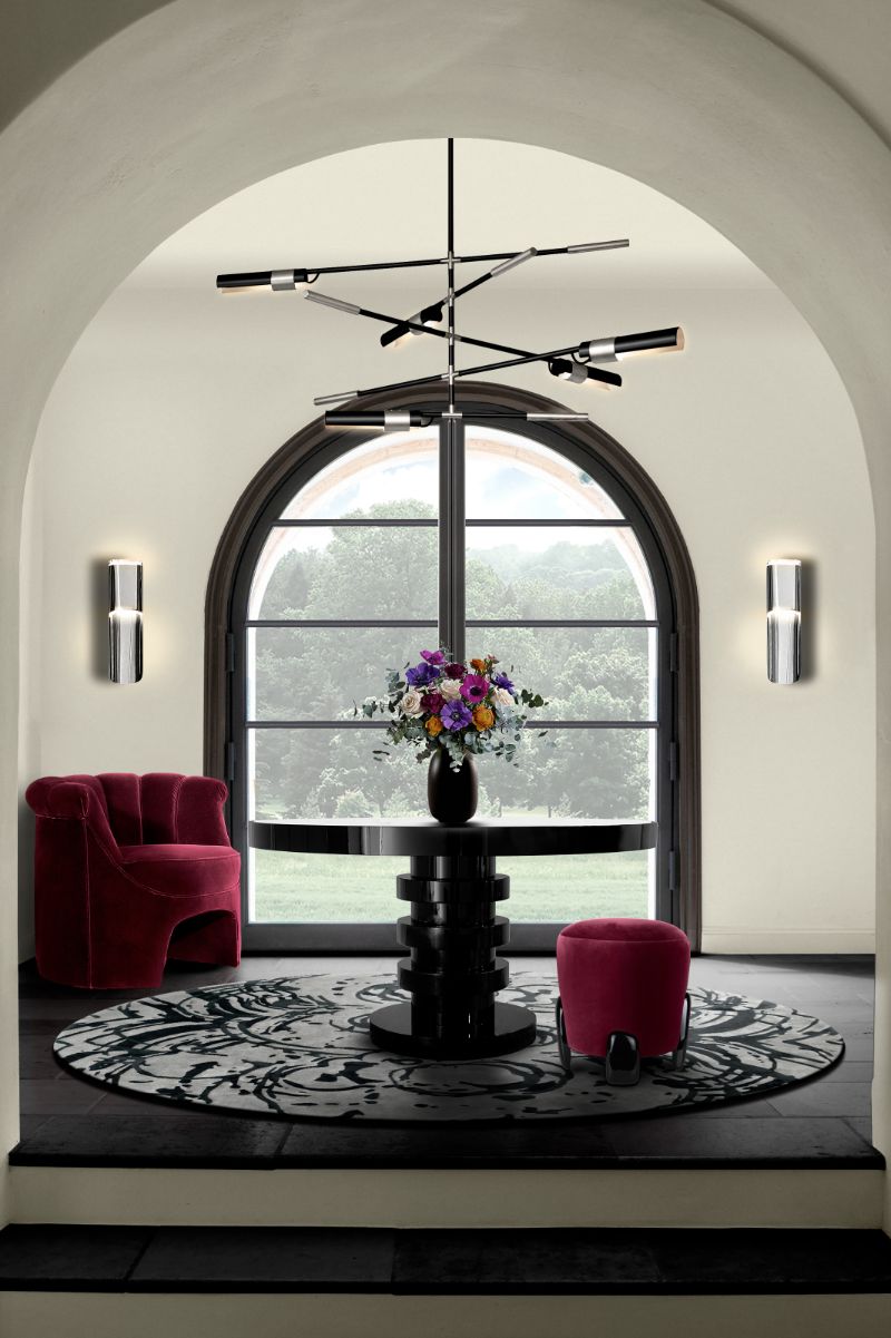 modern contemporary entryway with round blue rug.