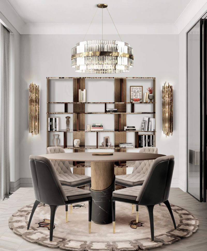 Neutral dining room with round rug and expensive suspension lights. Exceptional Rug Collection With Handmade Botanical Silk Rugs