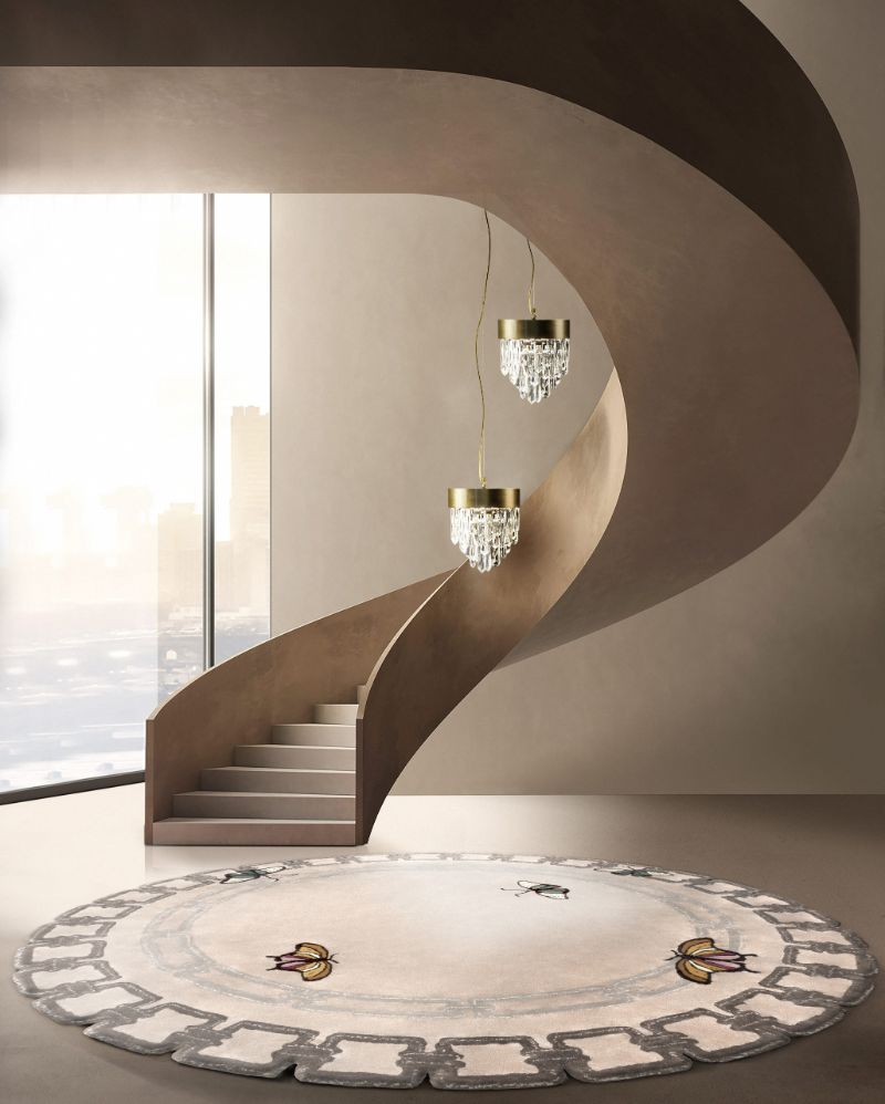minimalist entryway with neutral tones and a round rug with butterflies