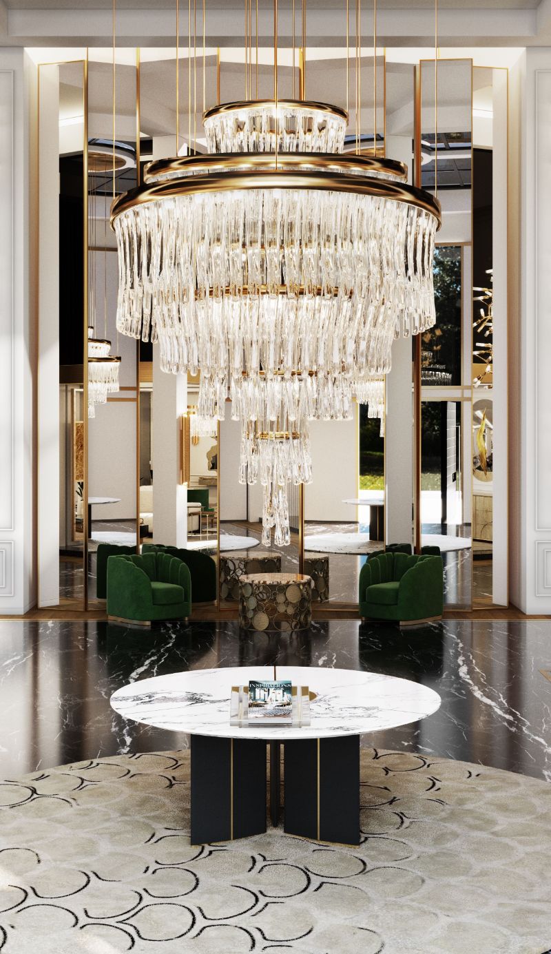 a gold tones living room with a round rug amd chandelier as the main carachter