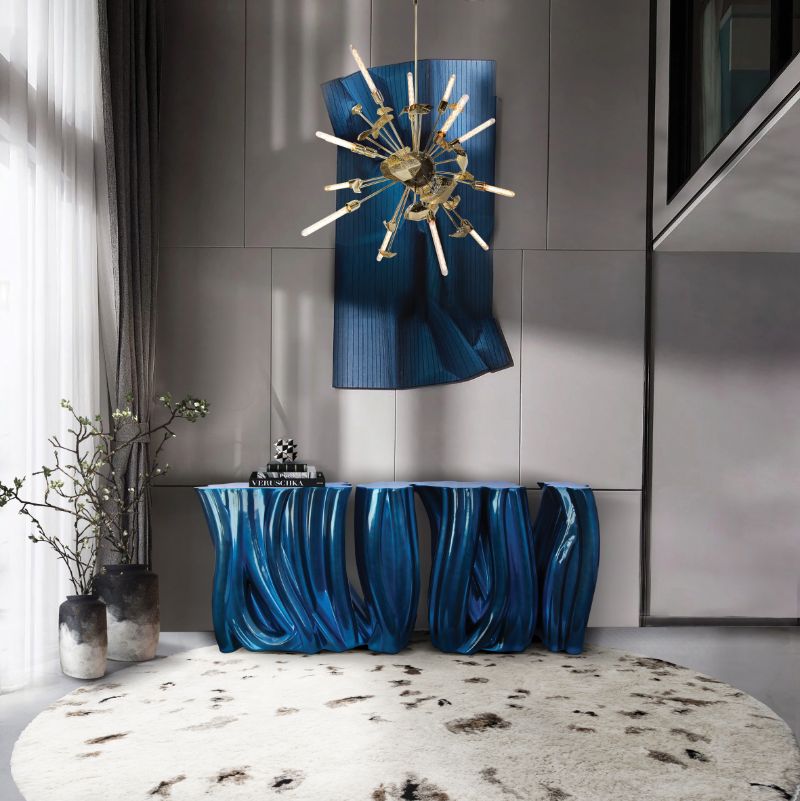 Sleek modern hallway in tones of blue with a white round rug and a blue console. The Most Exquisite Interiors Inspiration