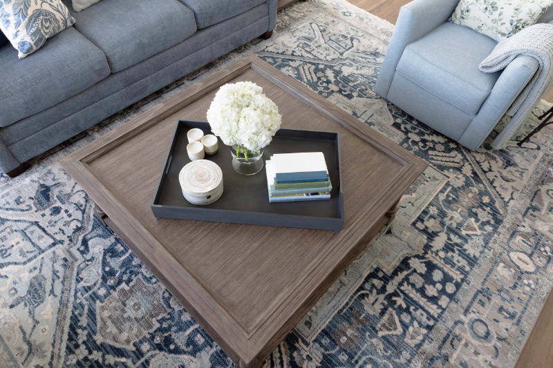 Rug Design Inspiration by Karen Davis. This rug matches all the colors of the furniture.