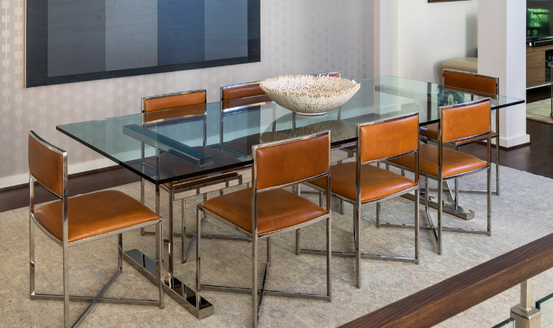 Rug Design Ideas From Pamela Hope Designs. This large dining table for eight people is on a large neutral rug.