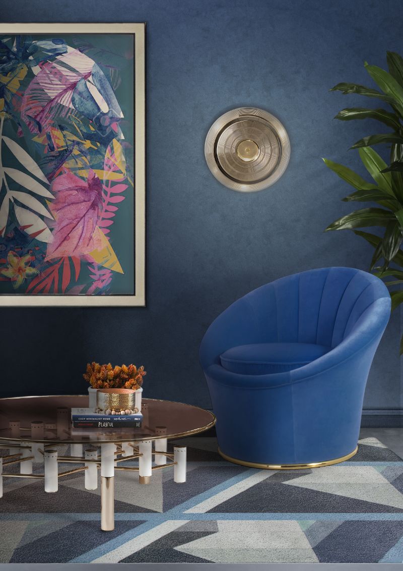 Geometric Rugs: 5 Reasons Why We Love them - reading corner with geometric rug and blue amrchair