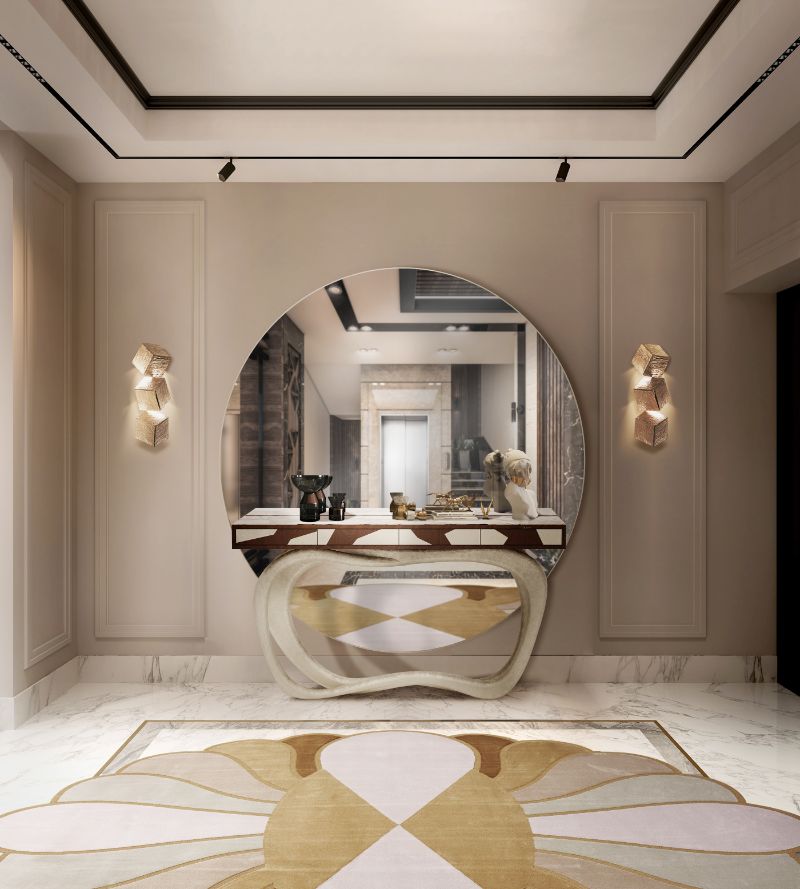 Silk Rugs with a oval irregular rug and round mirror with a console.