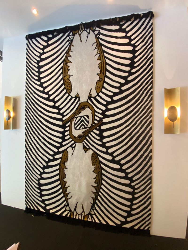 iSaloni Fair: the most romantic rug at isaloni 2022, a black and white design with brown hues and bird design