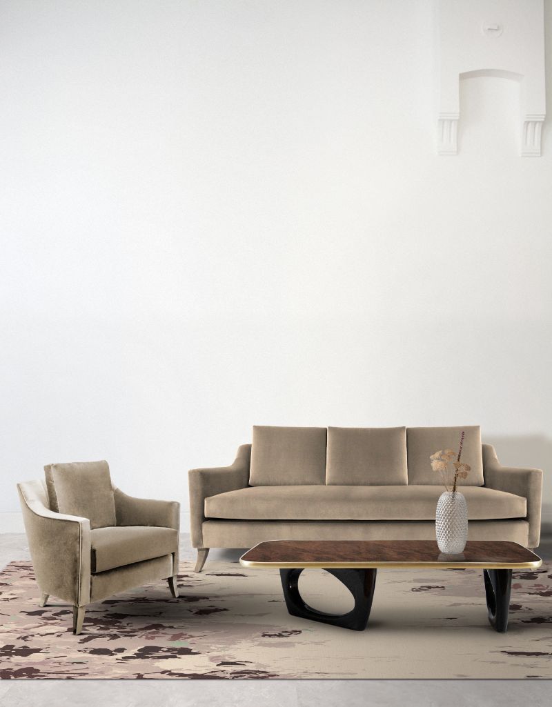 classic rugs with neutral colors and pink tones with sofa in dark beige