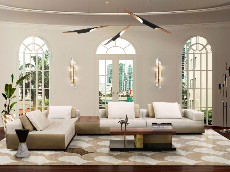 modern contemporary living room with neutral area rug with beige sofa and center table. Suzy Hoodless - Best Rug Designs