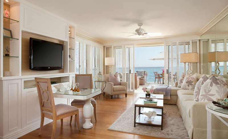 Rug Design Inspiration From Duncan & Miller Design. A neutral-toned rug under the sofa and center table of this living room.