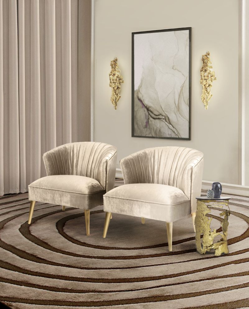 The Most Popular Living Room Area Rugs This Year, Neutral living room with area rug and armchairs
