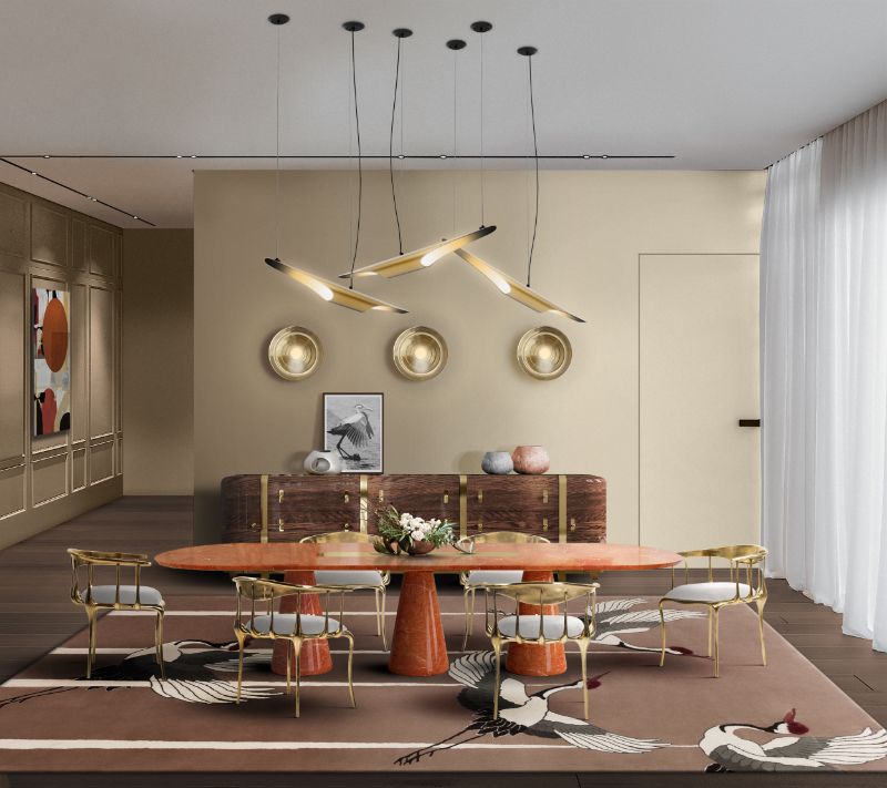 dining room rug with herons for pattern, the golden hues make this room a luxury feeling