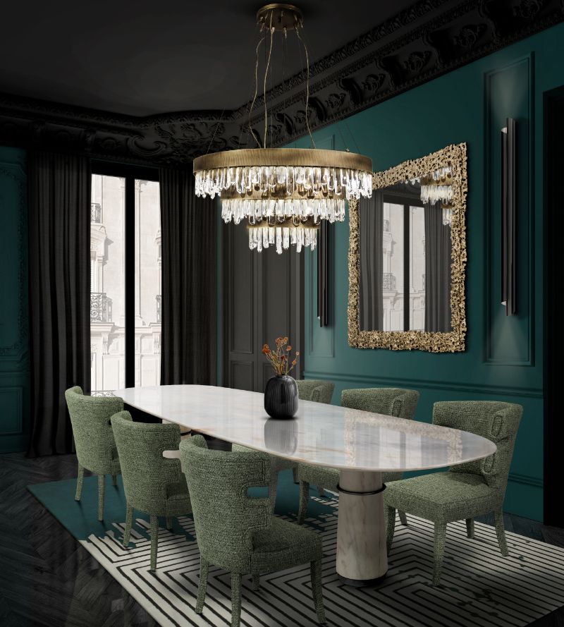 modern contemporary dining room in dark green tones with white marble dining table with chandelier