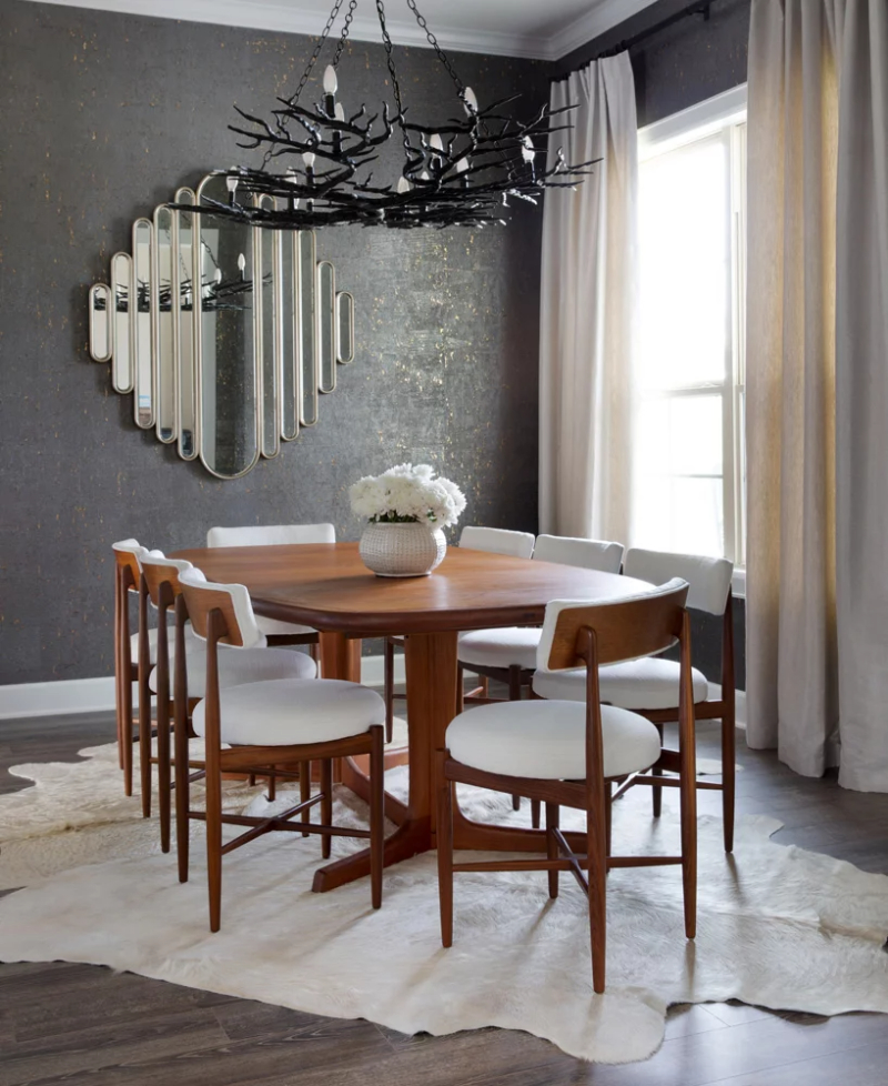 BANDD DESIGN: Rug Design Inspiration. A dining room with a white furry rug with an irregular shape.