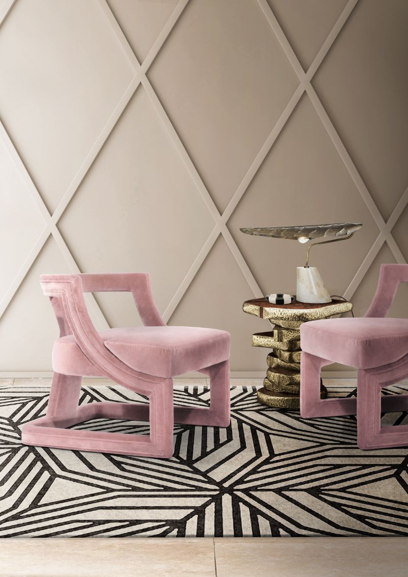 Our Top 6 Favorite Modern Rugs of Summer 2022. This modern living room has the CAUCA RUG decorating the floor with a geometric pattern. It is a minimalistic interior design with only the essentials.