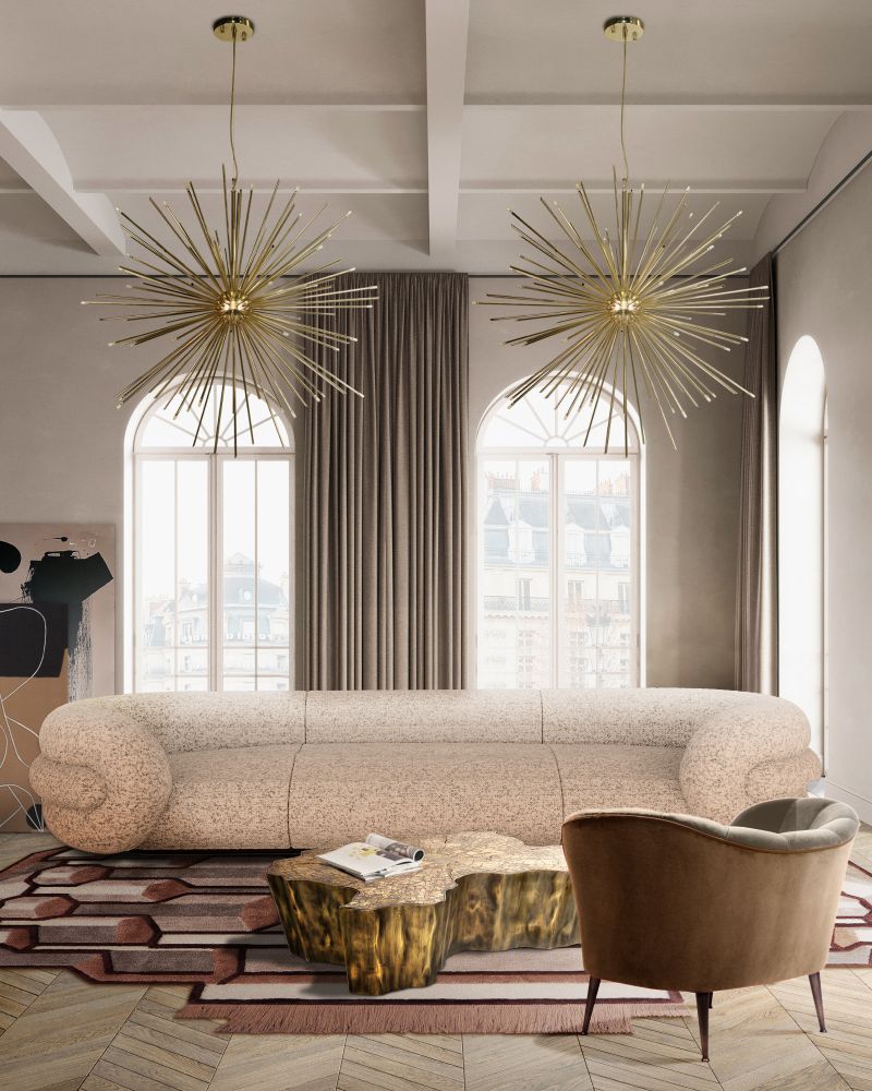 8 Ideas on Living Room Designs For 2023. Pink rug with irregular shape for living room with brown armchair and white beige sofa