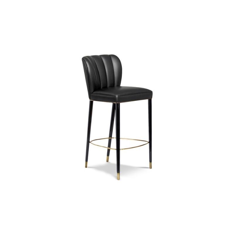 leather furniture. The DALYAN Dining Chair was inspired by Cleopatra and her opulent and elegant furniture. Fully upholstered in synthetic leather, the DALYAN Dining Chair balances feminine shapes with neutral colours, making it the ideal modern mid-century design chair to give the final touch to every project.